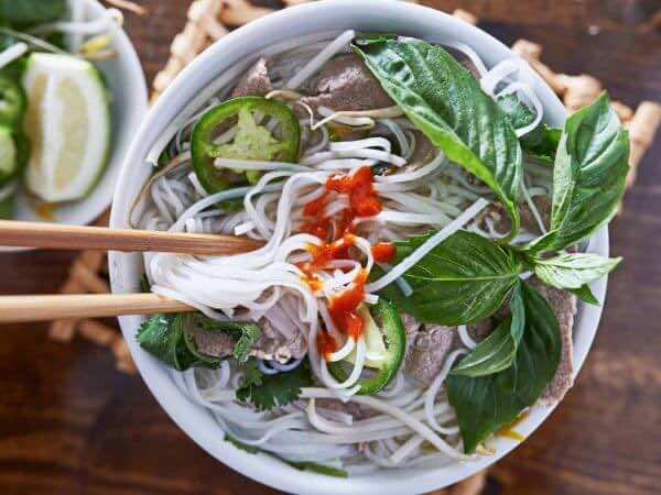 Slurping-a-bowl-of-Vietnamese-noodle-soup